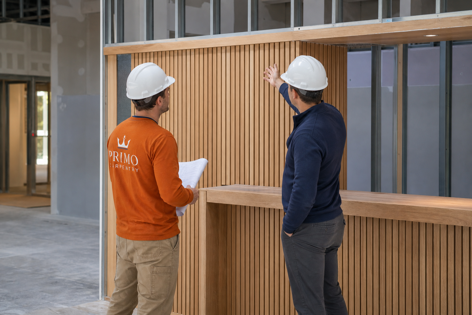 Custom commercial slatted wood feature reviewed during installation coordination